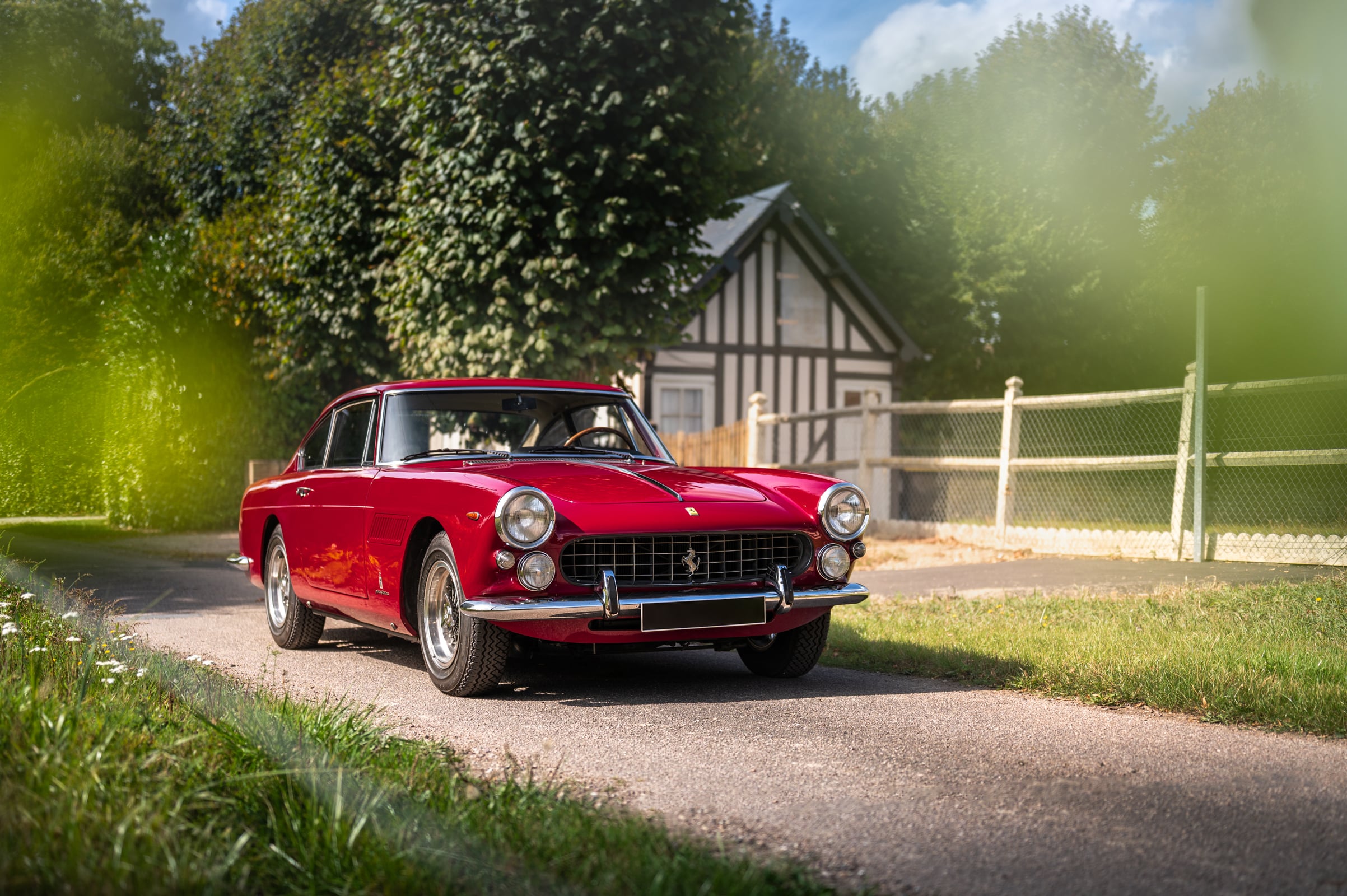 Célia Huart Ferrari 250 GTE red