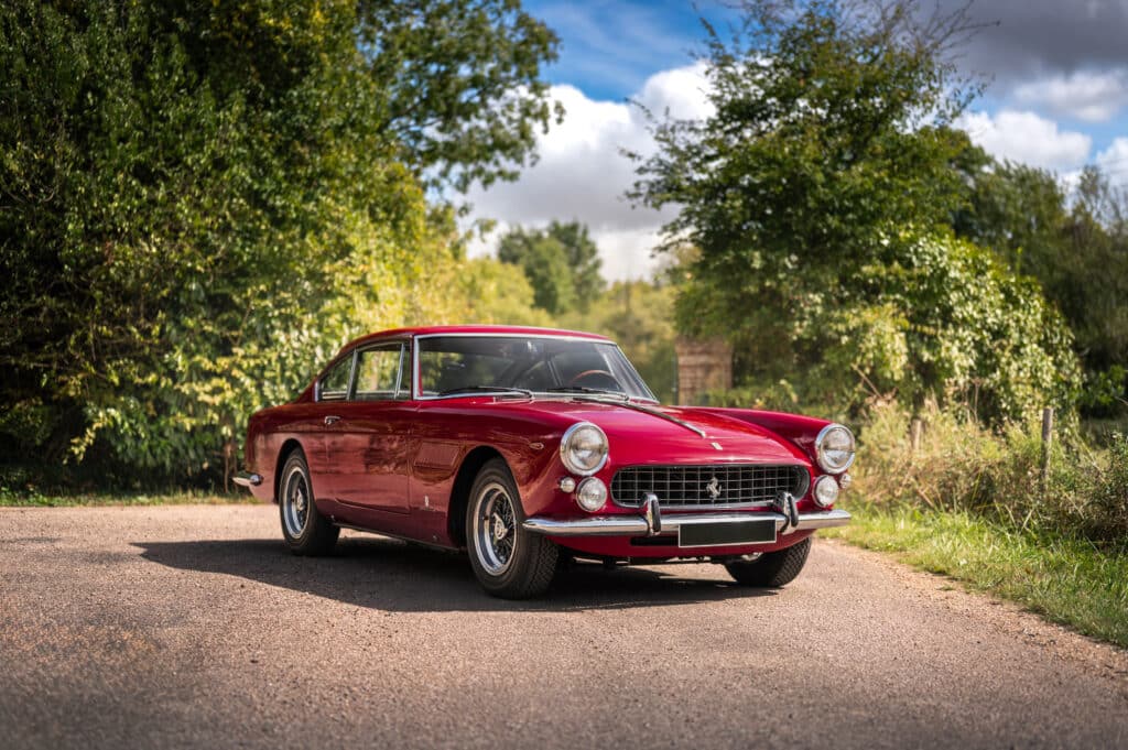 Célia Huart Ferrari 250 GTE red